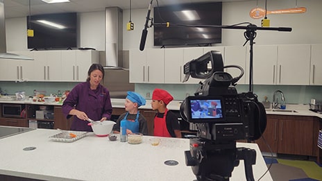 Video shoot of young kids in an instructional kitchen in Raleigh, North Carolina.